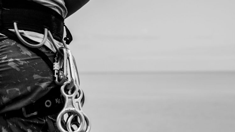 Black and white photo of climber's gear in Barra de Gramame, Brazil.