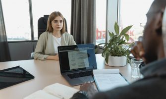 A professional job interview scene in a modern office setting, emphasizing recruitment and career opportunities.