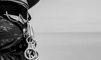 Black and white photo of climber's gear in Barra de Gramame, Brazil.