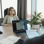 A professional job interview scene in a modern office setting, emphasizing recruitment and career opportunities.
