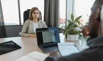 A professional job interview scene in a modern office setting, emphasizing recruitment and career opportunities.